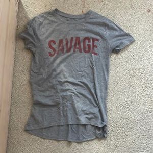 a short sleeved shirt, in grey coloring, in a size SX